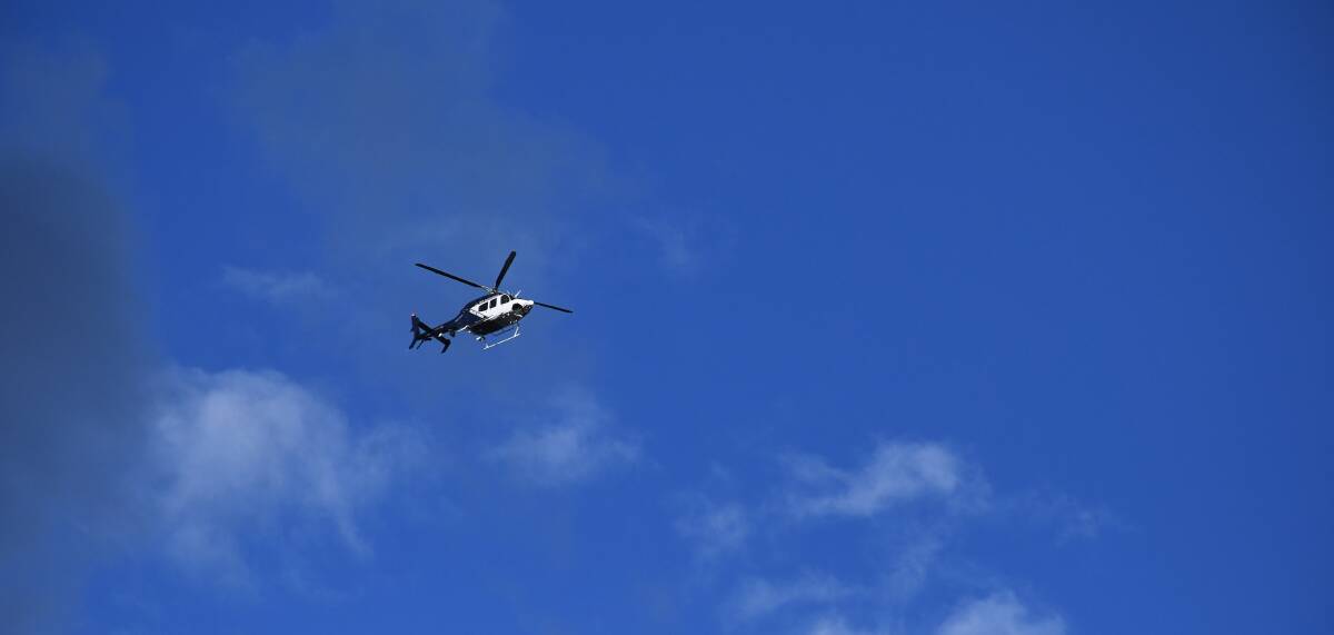 A police helicopter is assisting the search for Wennekes around Goulburn. Photo: Hannah Neale.