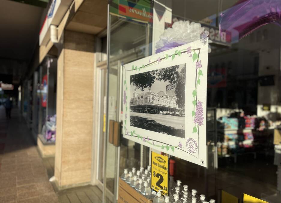 Goulburn's Best Buys, which is the formers Rogers store, is getting into the Lilac City Festival spirit with its historic photo display. Photo: Louise Thrower.
