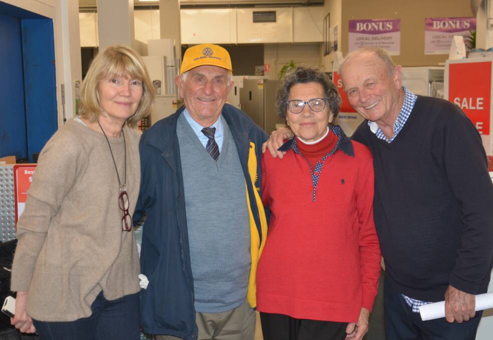 Tony and Adriana Lamarra caught up with Harvey Norman owner, Gerry Harvey and wife, Katie at the Goulburn store on Friday. Photo supplied.
