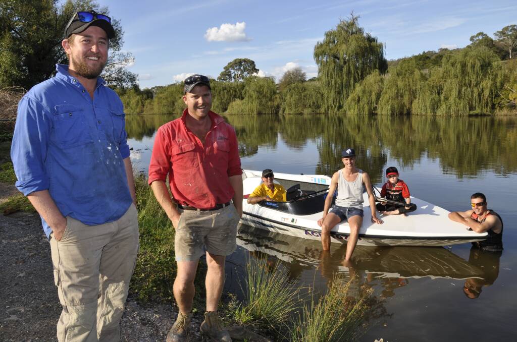 Members of Goulburn Barefoot Waterskiers Club Mitch Cook, president Scott Butz, Leon Robertson (in boat), Dean Roberson, Trent McEachen and son Lachlan at Copford Reach on Wednesday. Photo: Louise Thrower.