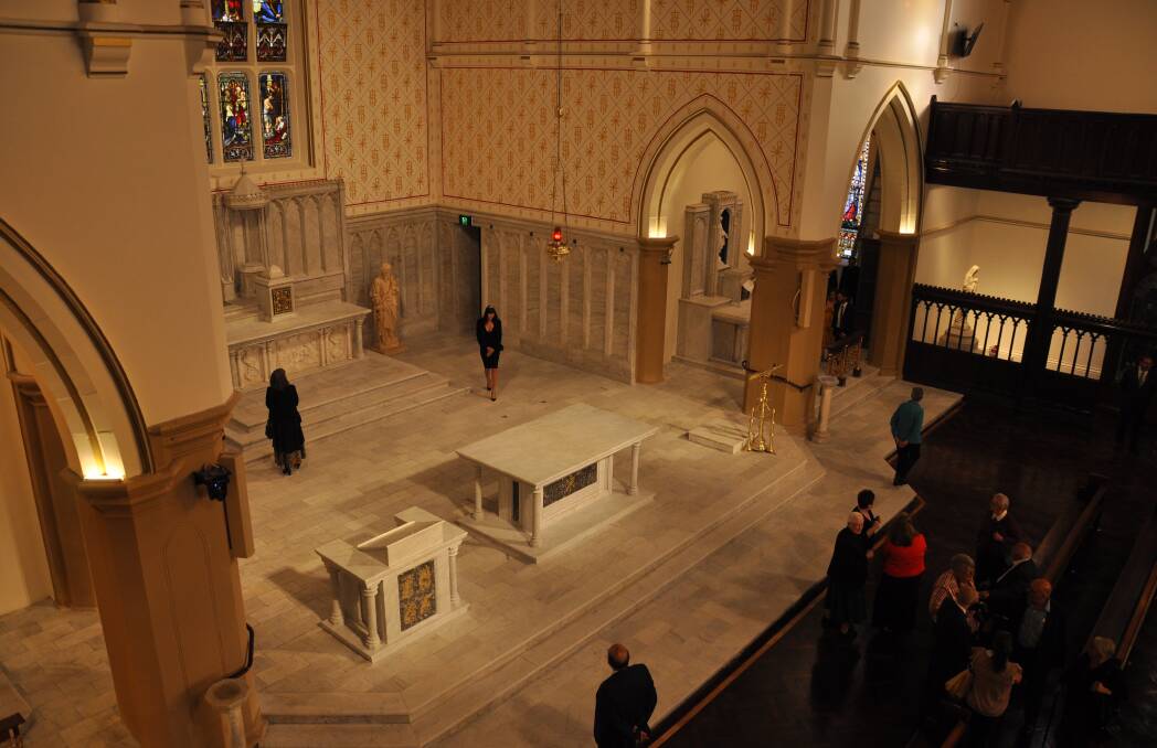 The new-look sanctuary with extended altar, ambo and restored stencilling on the walls. Picture by Louise Thrower.