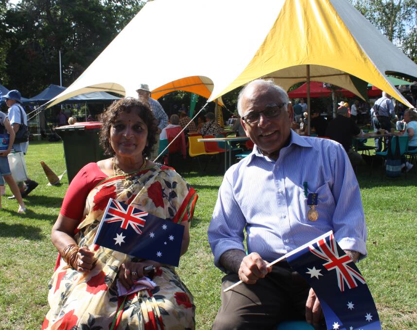 Dr Velu and wife, Chandra, enjoying Australia Day in Crookwell in 2016. Photo: Crookwell Gazette.