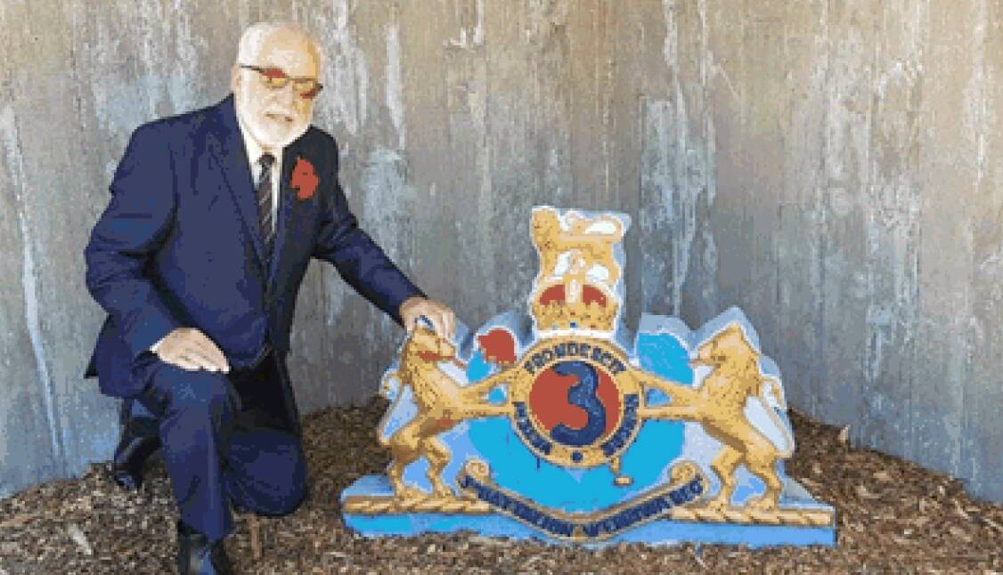 HISTORY BUFF: Ken Kenchington researched the colours and repainted the 3rd Werriwa Regiment badge, housed at the Rocky Hill War Memorial Museum. Image sourced.