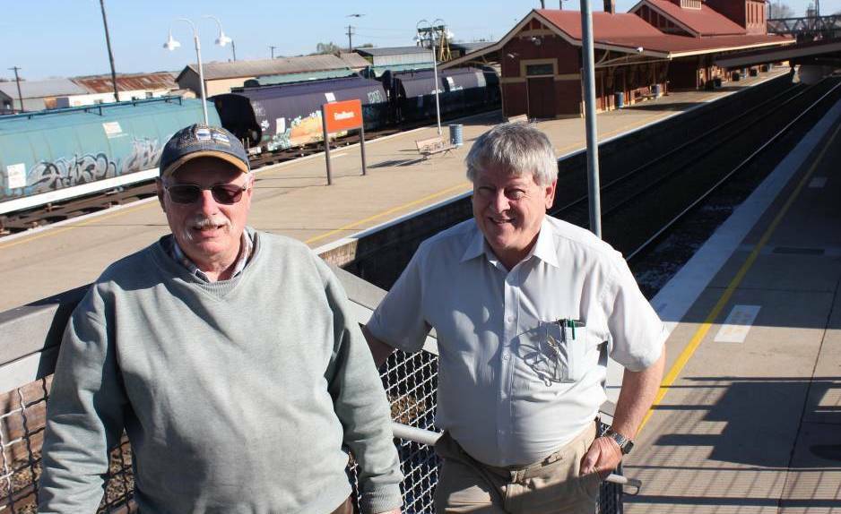 MISSED: The late Greg Price (left), strongly advocated for better train services for Goulburn and region. He is pictured here several years ago with with friend and fellow Southern Tablelands Rail User Group member, John Proctor. Photo: David Cole.