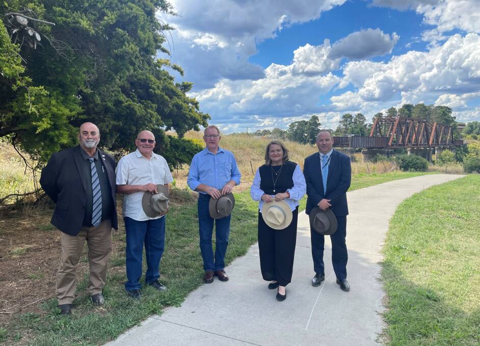 Mayor Peter Walker, rail trail steering committee member, Cr Michael Prevedello, chair Cr Bob Kirk, Goulburn MP Wendy Tuckerman and council CEO Aaron Johansson at the recent funding announcement for the feasibility study. Picture supplied.