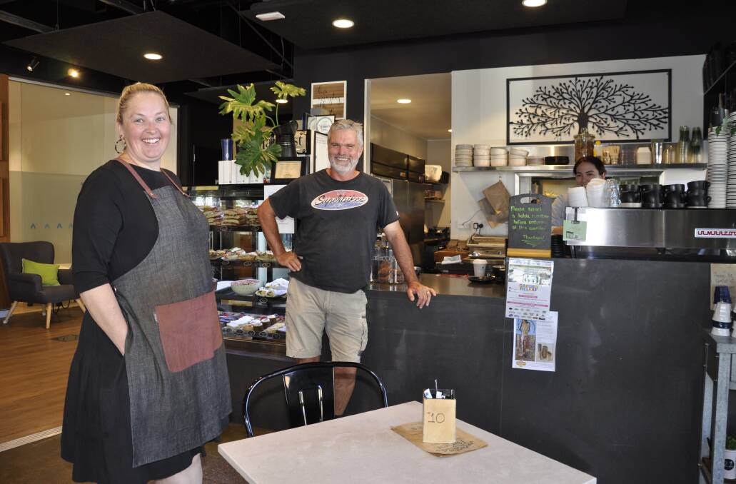 Harvest Cafe owner Janine Heat, customer Cliff Muddiman and staff member Shari Russell before the 12 noon Monday restaurant and cafe shutdown. Photo: Louise Thrower.