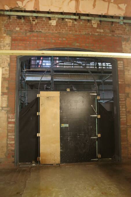 OLD AND NEW: Large glass panel doors will be installed to provide the entry from the old section of the former town hall to the auditorium at the performing arts centre. Original elements of the old building have been kept where possible. Photo supplied.