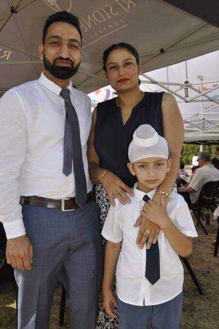 Gurjant Singh, wife Sharanjeet Kaur Jhajj and their son Fateh Singh Anttal awaited the citizenship ceremony.