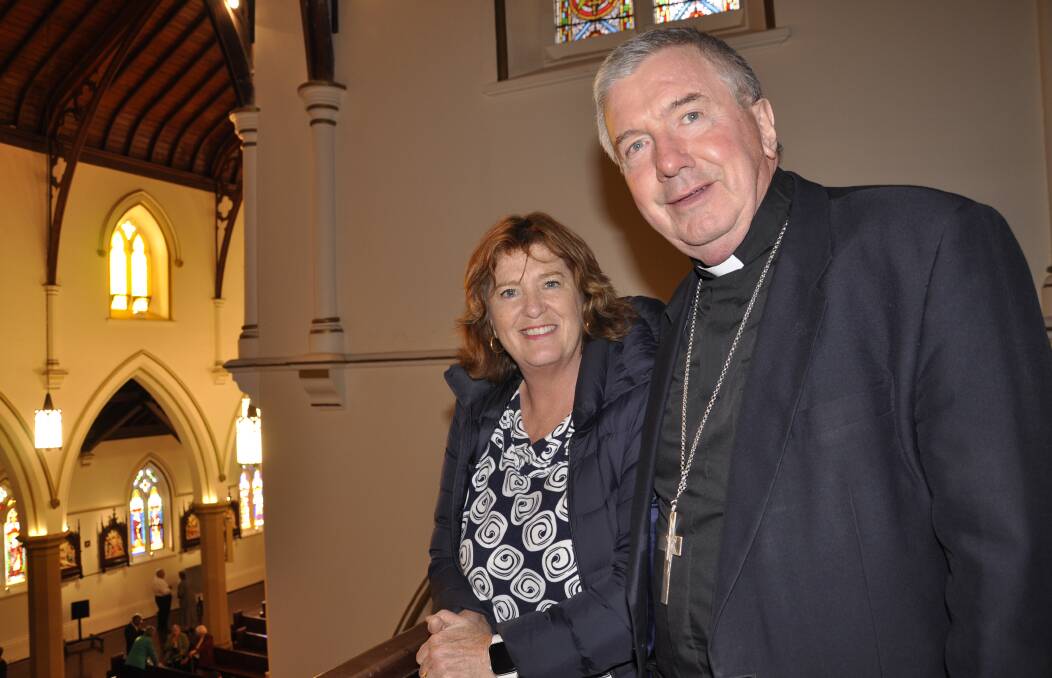 Canberra/Goulburn archdiocese financial administrator, Helen Delahunty with Archbishop Christopher Prowse at Sts Peter and Paul's Cathedral last November. Picture by Louise Thrower.