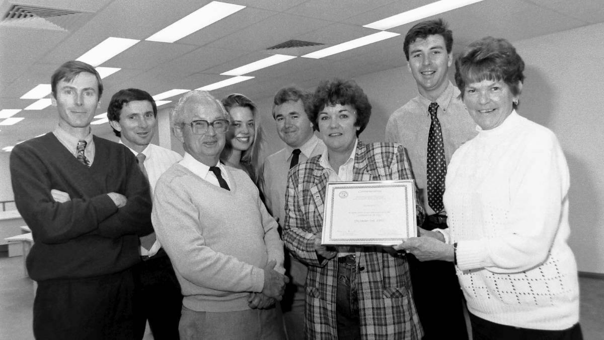 Ian Frazer (second left) with the Goulburn Post team and then Mayor Pat Fairall (third right) in the early 1990s. Picture Goulburn Post archives.