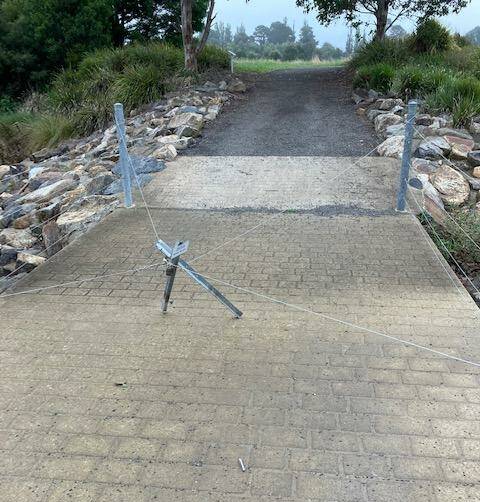 Vandals rigged up a trip hazard from star pickets and railing wire ripped from the Eastgrove wetlands area. Picture by Heather West.