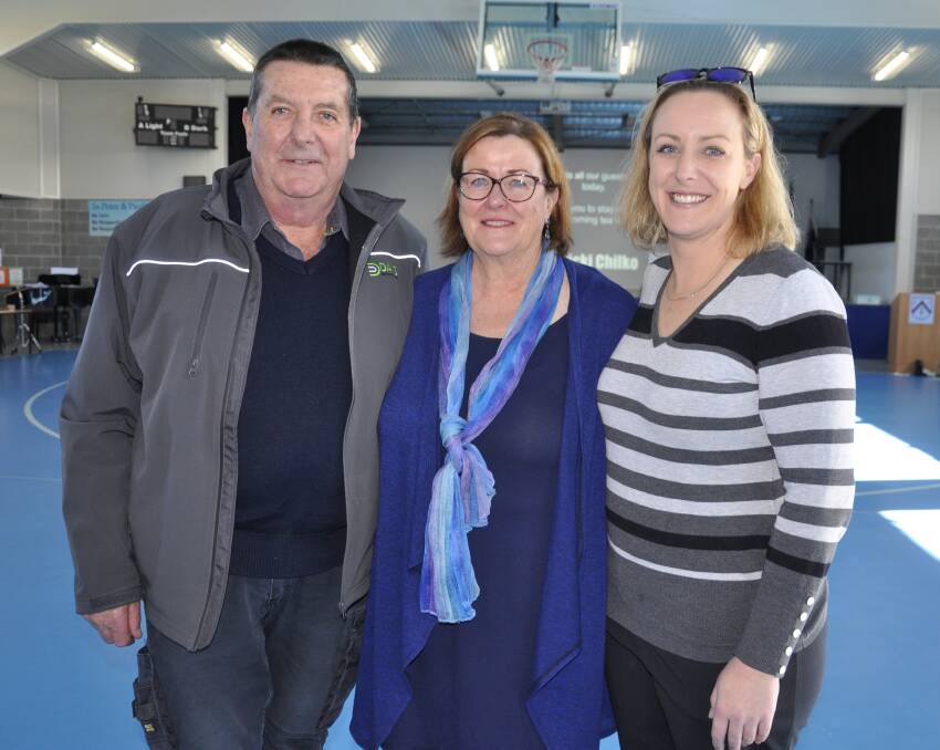 Retiring Sts Peter and Paul's learning support teacher Vicki Chilko with husband, Rob, and daughter, Rebecca at Monday's farewell function. Picture by Louise Thrower.