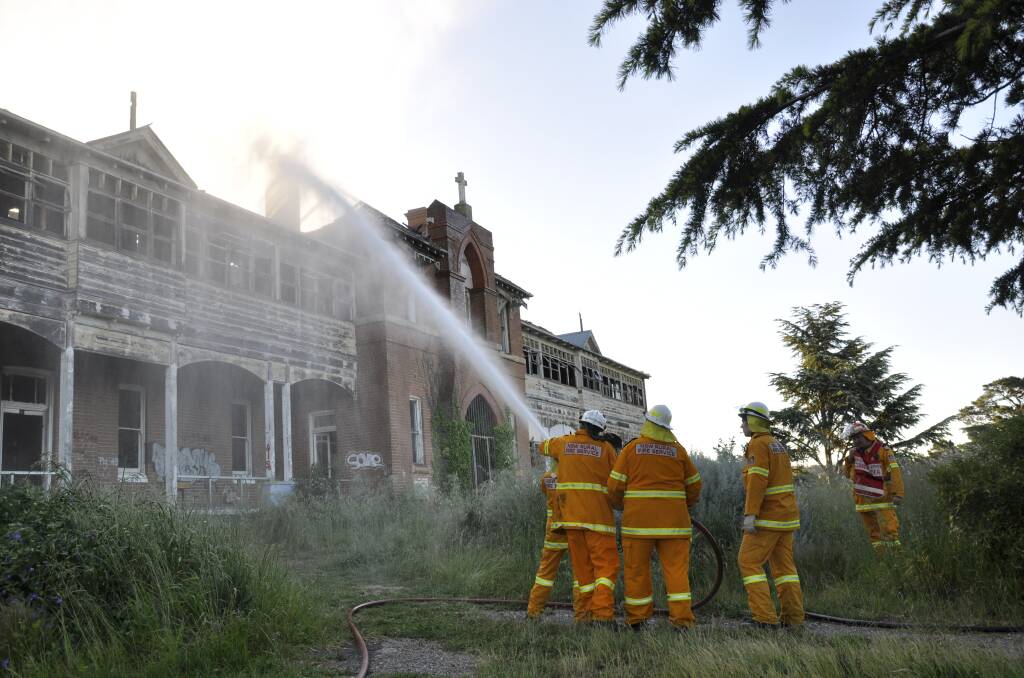 Firefighters tackle the blaze at St John's orphanage head on. 