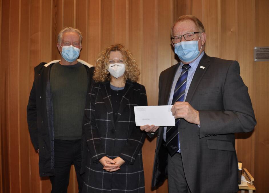 KIND GESTURE: Mayor Bob Kirk presented a cheque to Daryl and Maggie Patterson at the most recent council meeting. The funds will go towards food aid in Quelicai, East Timor, with which Goulburn has a friendship agreement. Photo: Louise Thrower.
