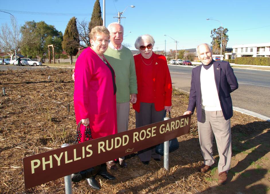 DEDICATION: Ev Boswell, the late Allan 'Jockey' Rudd, Phyllis's sister Pat Leeson and her late husband Ray at the memorial garden in 2009.