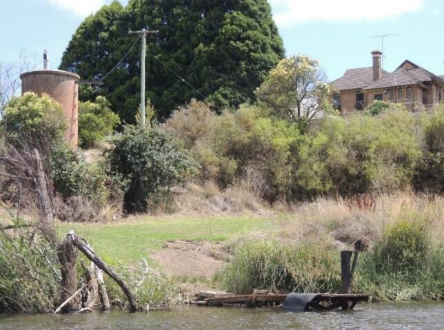 Remnants of a wharf are visible behind Kenmore Hospital on the Wollondilly River. Photo: Phil Leighton-Daly.