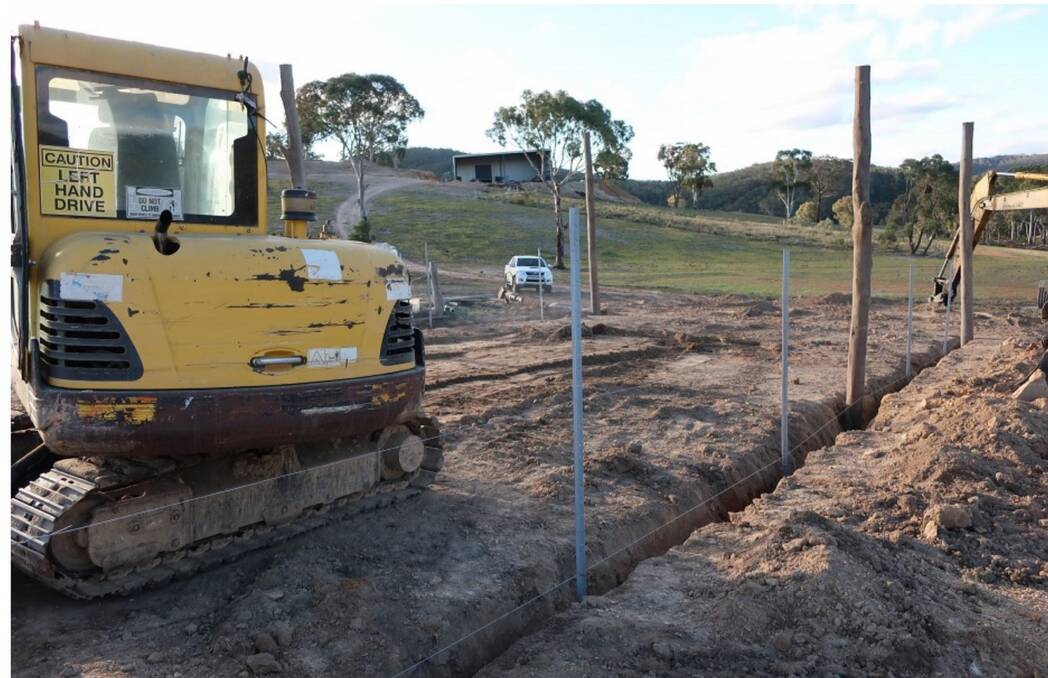 BUSY: Council compliance officers photographed excavation work underway at the Forest Siding Road property in May. The owners said it was for a chicken coup. Photo: Supplied.
