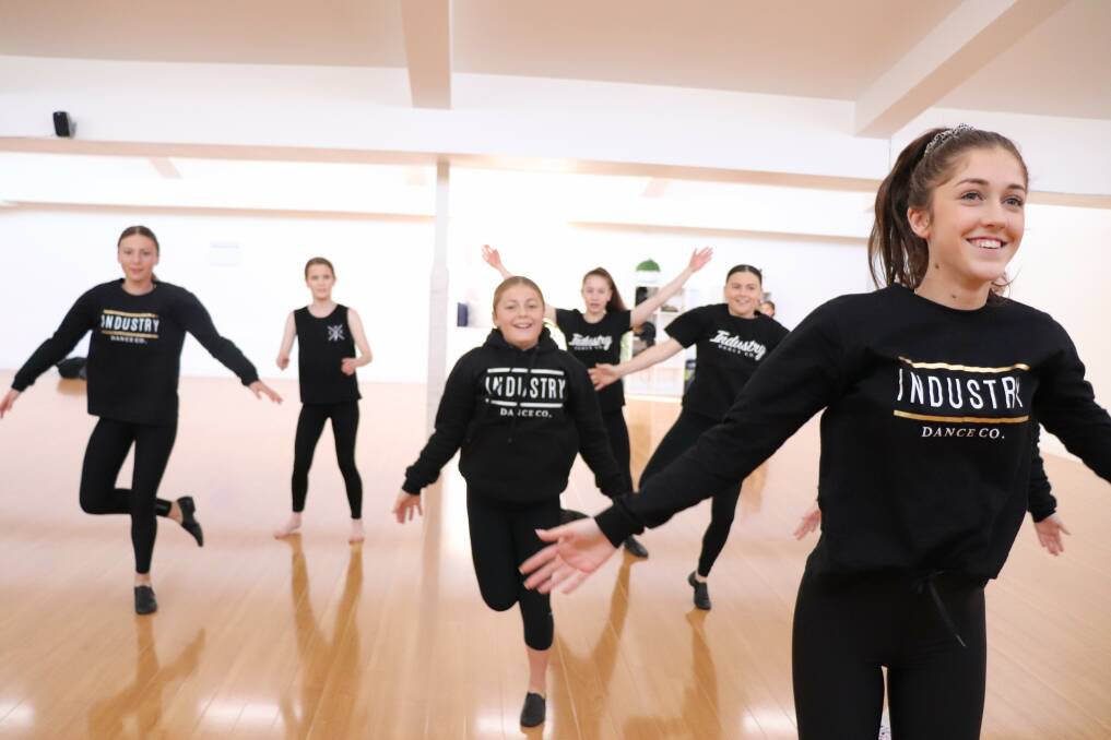 Artistic director Adara Chandler leads Industry Dance Co performers. The dance company is rearranging its US trip given Disneyworld's closure. Photo supplied. 