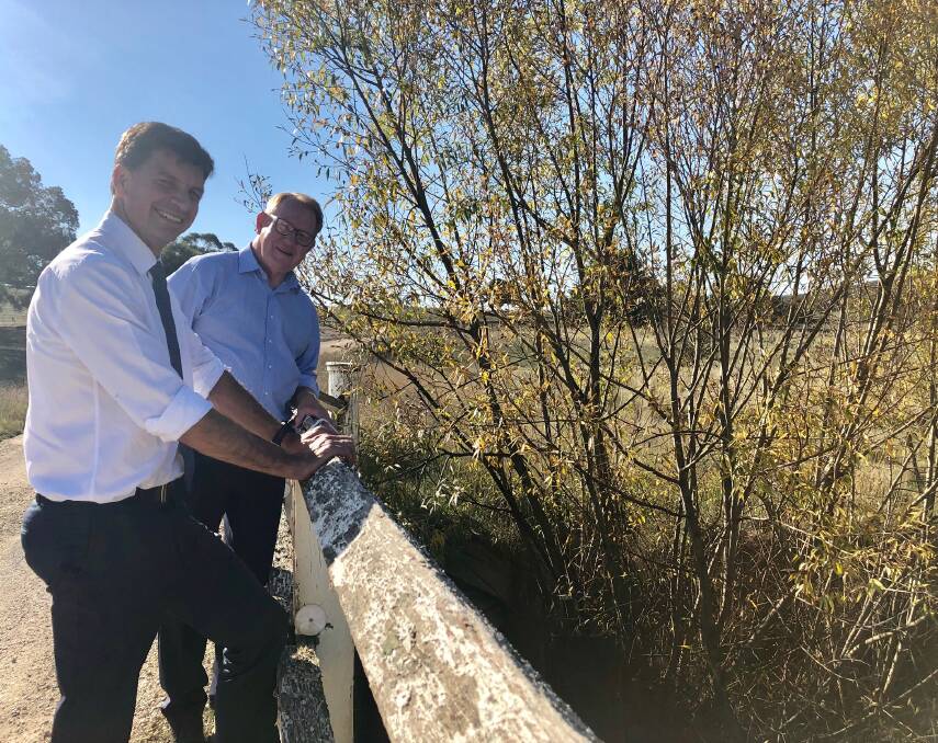 OUT WITH OLD: Hume MP Angus Taylor and Mayor Bob Kirk at Thornford Bridge, for which Mr Taylor announced $423,826 towards replacement. Photo supplied.