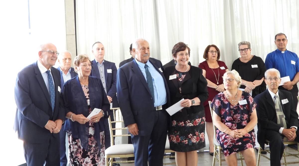 Sts Peter and Paul's Cathedral restoration committee chair, Dr Ursula Stephens, received a $40,000 donation towards the project from Angelo Stivali, president of the Association of St Sebastian Martyr of Cerami, at a recent Sydney function. Picture by Tony Lamarra.