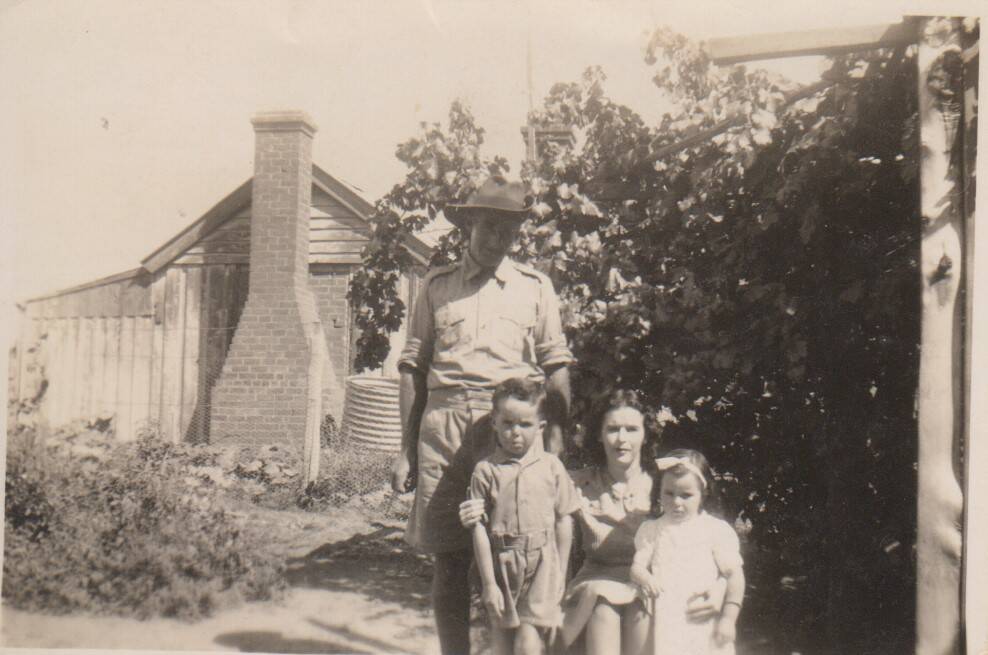 Jean Elliott with children Tom and Nola and their grandfather, George Richards, who became like a father figure. Photo supplied.