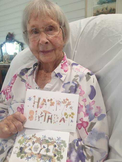 LOVED: Muriel McGilvray, pictured here in January with one of her handmade cards, passed away at Ballina on January 29. Photo supplied.