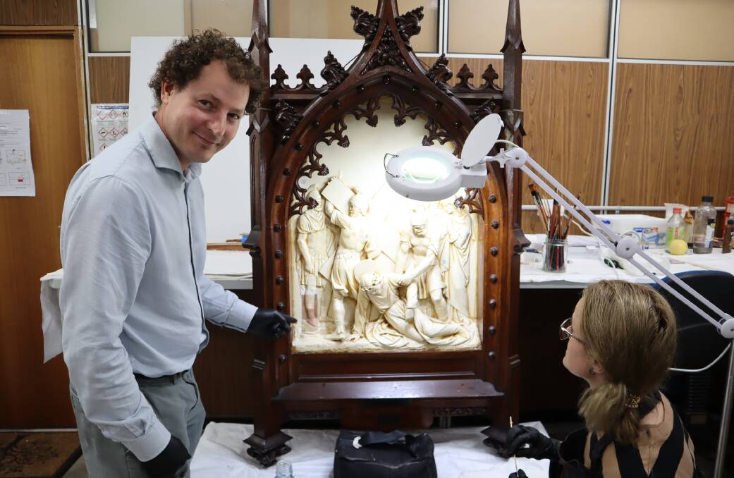International Conservation Services head of conservation (fine and decorative arts), Adam Godijn and his team discovered that the Stations of the Cross were originally painted. Picture supplied.