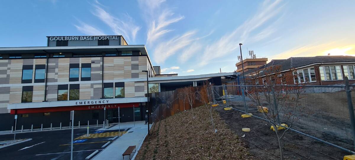 The undercover coffee and food van would be provided between the new and old sections of the hospital (centre of photo) but exposed to a "wind vortex," Ant Lewis said. 