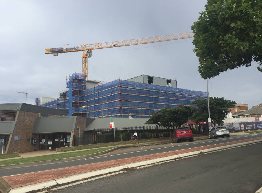 PLENTY OF WORK: The Goulburn Hospital redevelopment is proceeding apace but contractors are continuing to park in nearby residential streets, including Cowper Street, same some councillors. Photo: Louise Thrower.