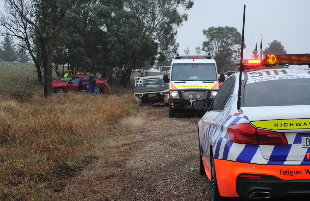 Police an ambulance were quickly on the scene of a single vehicle crash on the Crookwell Road. Photo: Louise Thrower.