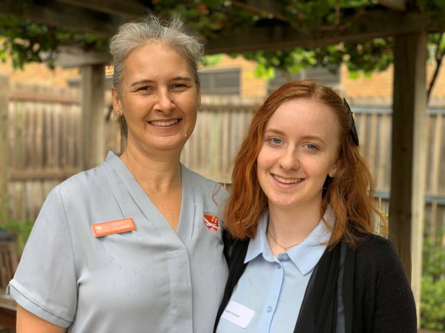 HELPING HAND: Rowena Russell (right) received a Country Education Foundation of Goulburn and District grant in 2019 as she embarked on Bachelor of Creative Arts and Bachelor of Commerce degrees at the University of Wollongong. She was accompanied to the presentation by her mother, Penny Russell. Photo supplied.