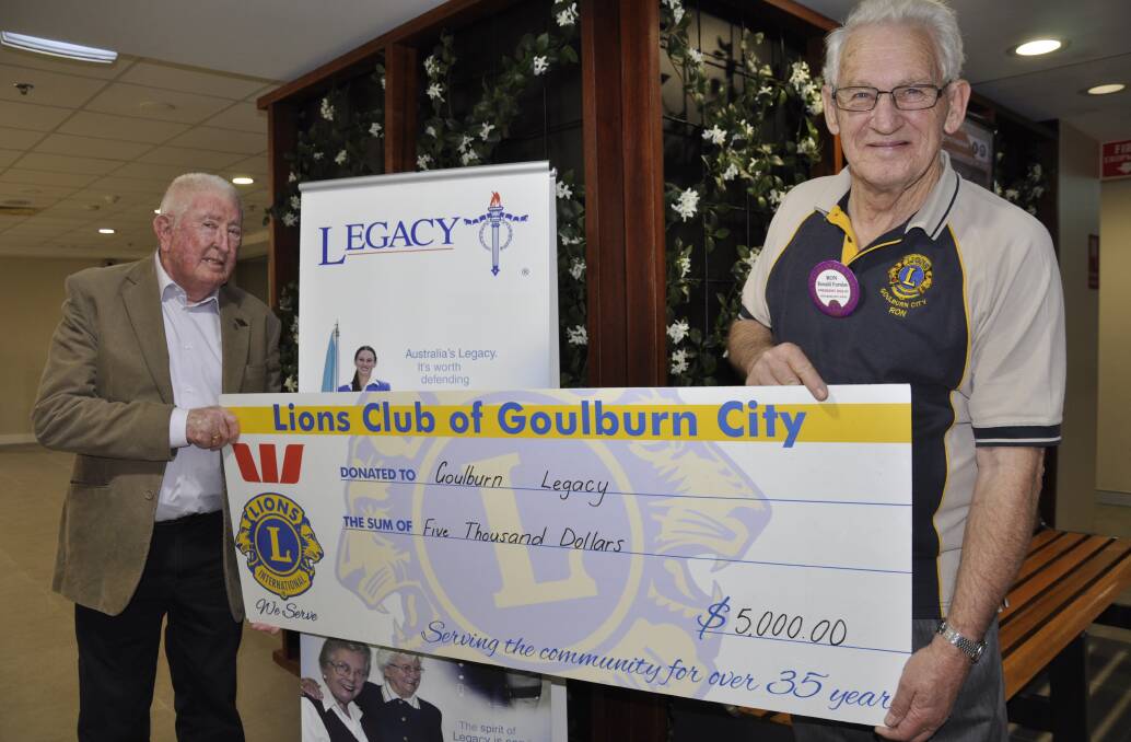 Goulburn Legacy president Don Pennay (left) gratefully accepted a $5000 donation from Lions Club of Goulburn City president, Ron Furniss, on Friday. Photo: Louise Thrower.