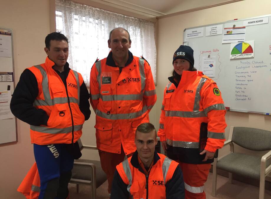 Goulburn SES volunteers Trent McEachan, Darren Waite, Leah Herrett and Lachlan Alford were on hand on Sunday afternoon. Mr McEachan was preparing to deliver medication by boat to a Towrang resident. Photo: Louise Thrower.