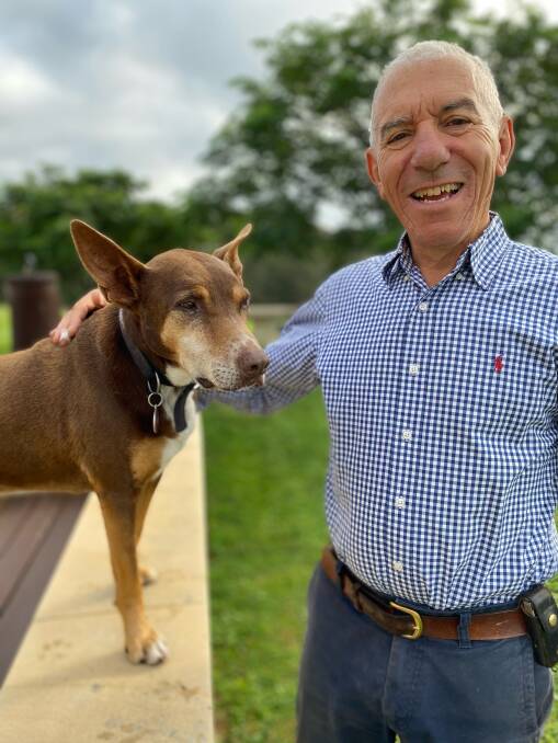 HAPPY: Dr Robert Favaloro was a Sydney GP for more than 40 years but has retired to his Tirrannaville property near Goulburn that he shares with wife, Gail, and dog, Scoobie. Photo supplied.