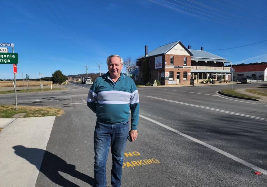 PRESSURES: Tarago and District Progress Association president Adrian Ellson says the village must be allowed to grow more. Residents also want the Braidwood Road/Wallace Street intersection (behind) upgraded as a matter of safety. Photo: Megan Alcock. 