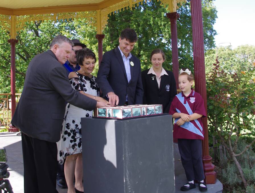 Dean Phillip Saunders, Pru Goward and Angus Taylor cut Goulburn's birthday cake at last year's Our Living History festival.