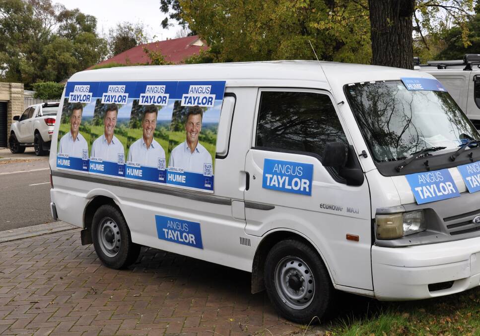 Candidates for the Hume election have taken to van and vehicles to promote themselves. Photo: Louise Thrower. 