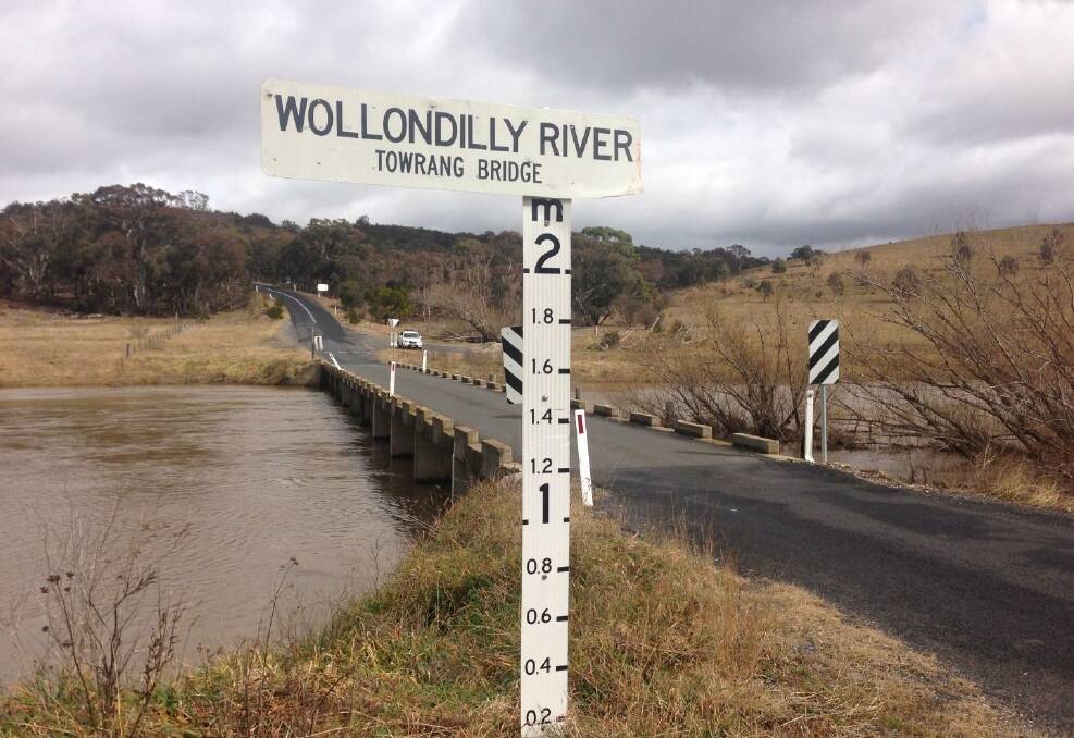 Towrang Bridge picture in better times following rainfall in 2014. The community is asking for an upgrade of the structure. Photo: Louise Thrower.