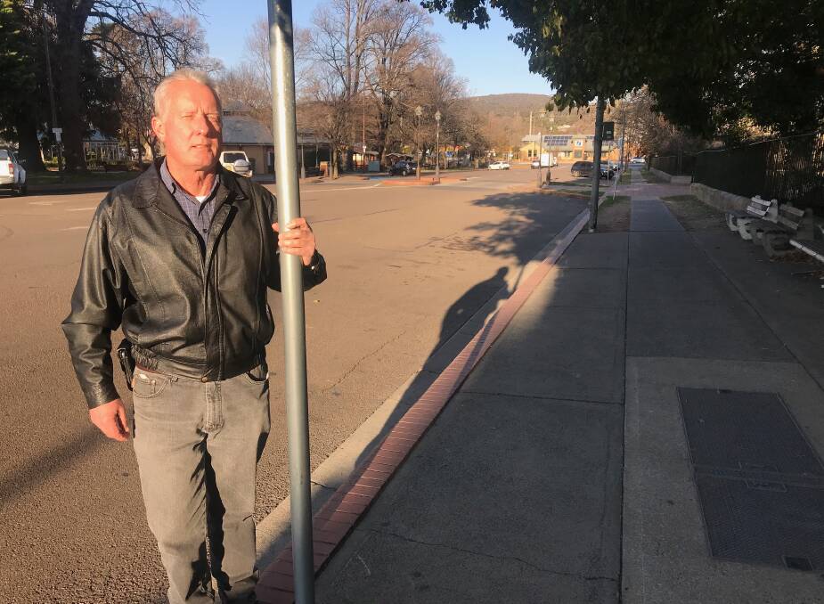 No stopping: Barry McDonald at the Montague Street bus stop. Letter writer Tempe Hornibrook says the plan to remove the stop is "a joke." Photo: David Cole.