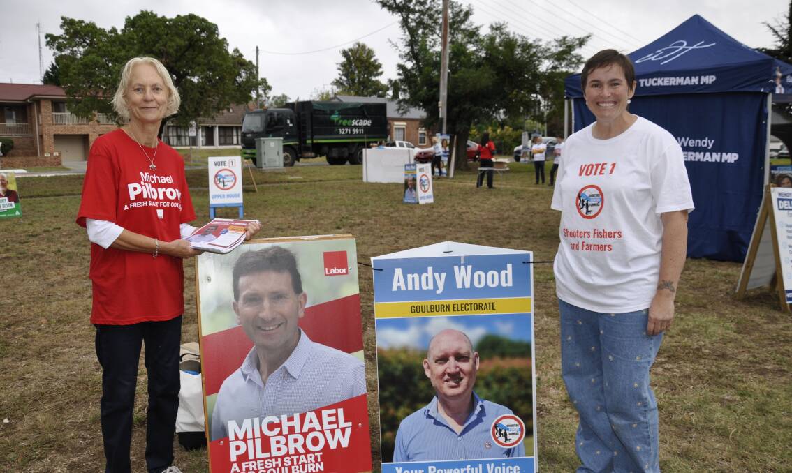 A friendly atmosphere was in the air at Goulburn Scout Hall booth, were Labor volunteer, Helen Rainger and Catriona Wood, the wife of Shooters, Fishers and Farmers candidate, Andy Wood, campaigned for voted. Picture by Louise Thrower. 