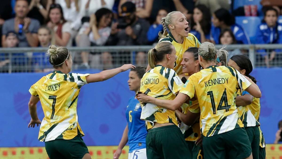  Australia's players celebrate after Chloe Logarzo scored their side's second goal.

