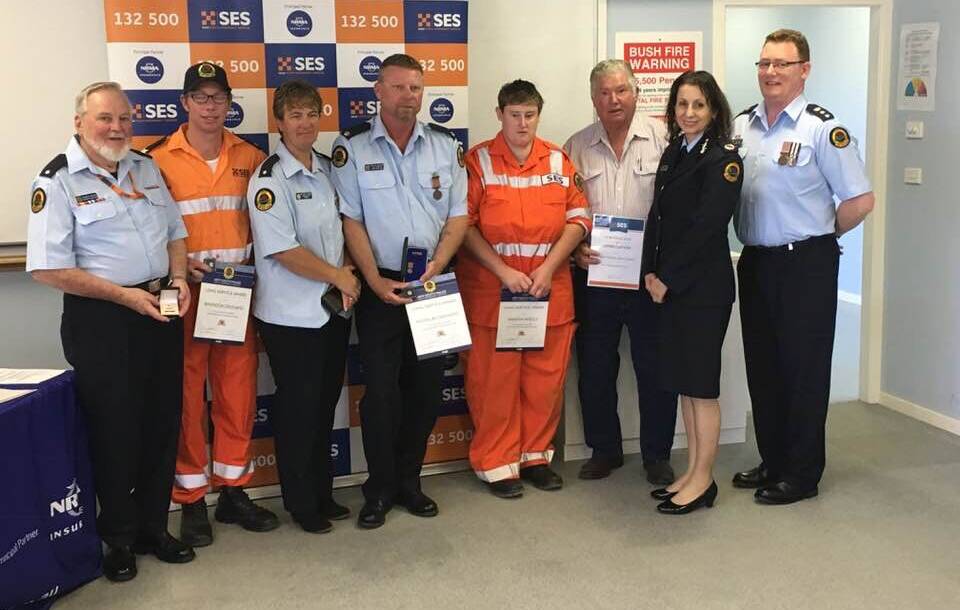SES awards: Ric Murray, Brendan Orchard, Melissa Orchard, Nic Orchard, Amanda Skelly, Upper Lachlan's Mayor Brian McCormack OAM, NSW Director for People and Culture, Kathleen Lacuto and MSw SES Region Controller Colin Malone. Photo Bronwyn Haynes.