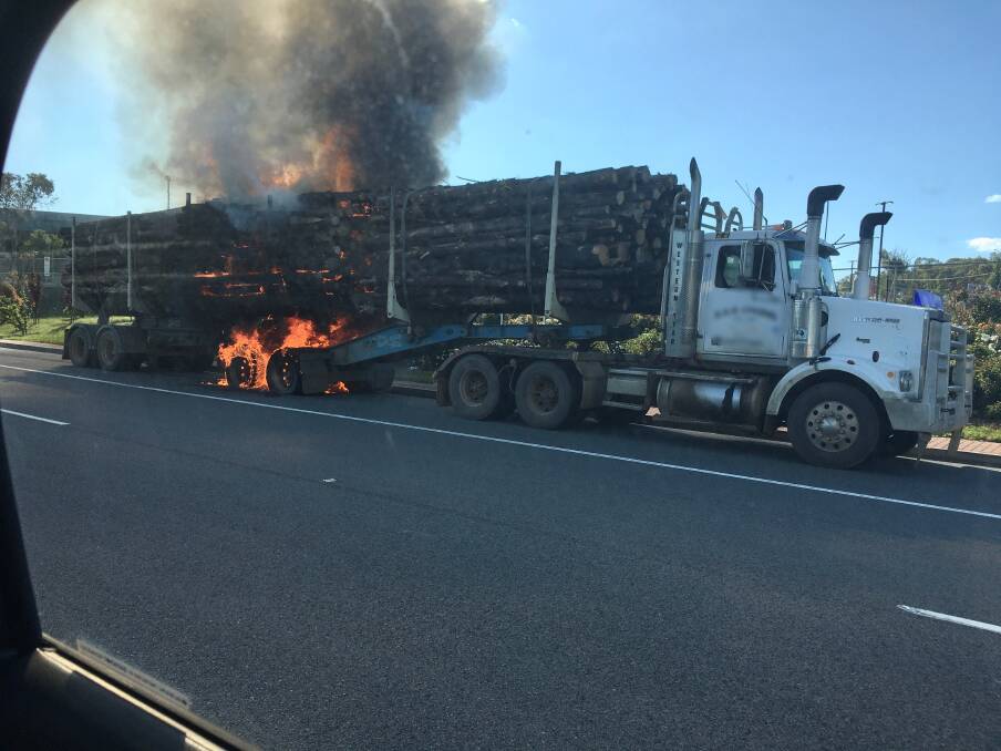 A truck fire has affected traffic in both directions in Hume Street between the Hume Highway and Ducks Lane. Photo: Brian Hill