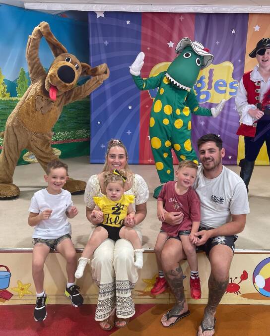 Nikita and Harley Hunter with their children (from left) Harry, 5, Isla, 2, and Paddy, 3, on a recent trip to Dreamworld. Picture: Supplied