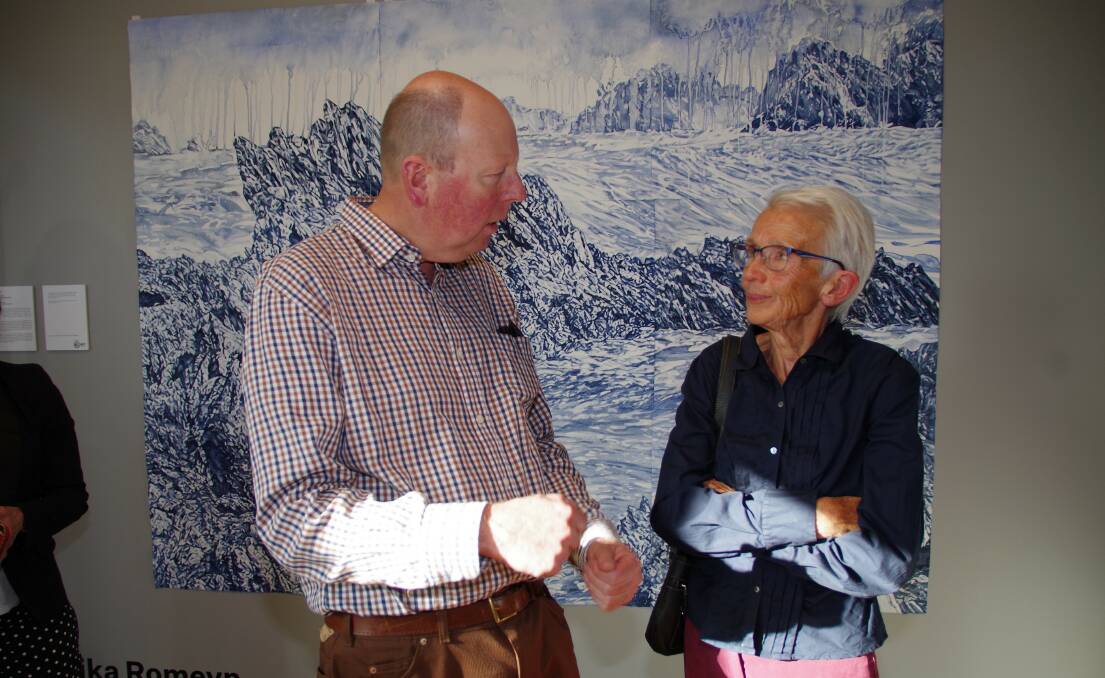 Steve Hartup talking with Goulburn's first Regional Gallery director Jennifer Lamb.