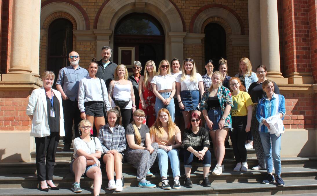 The criminology students and academics from Runshaw College, Lancashire, UK and from Charles Sturt University, at the Goulburn Courthouse. They were joined by Chamber Magistrate Bernadette Hilton. Photo David Cole. 