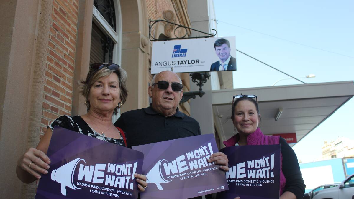 UPDATE THE FEDERAL AWARD: GDU president Anna Wurth-Crawford, Bob Stephens and Maimiti Sarah out the front of Angus Taylor's office on Monday. Photo David Cole. 