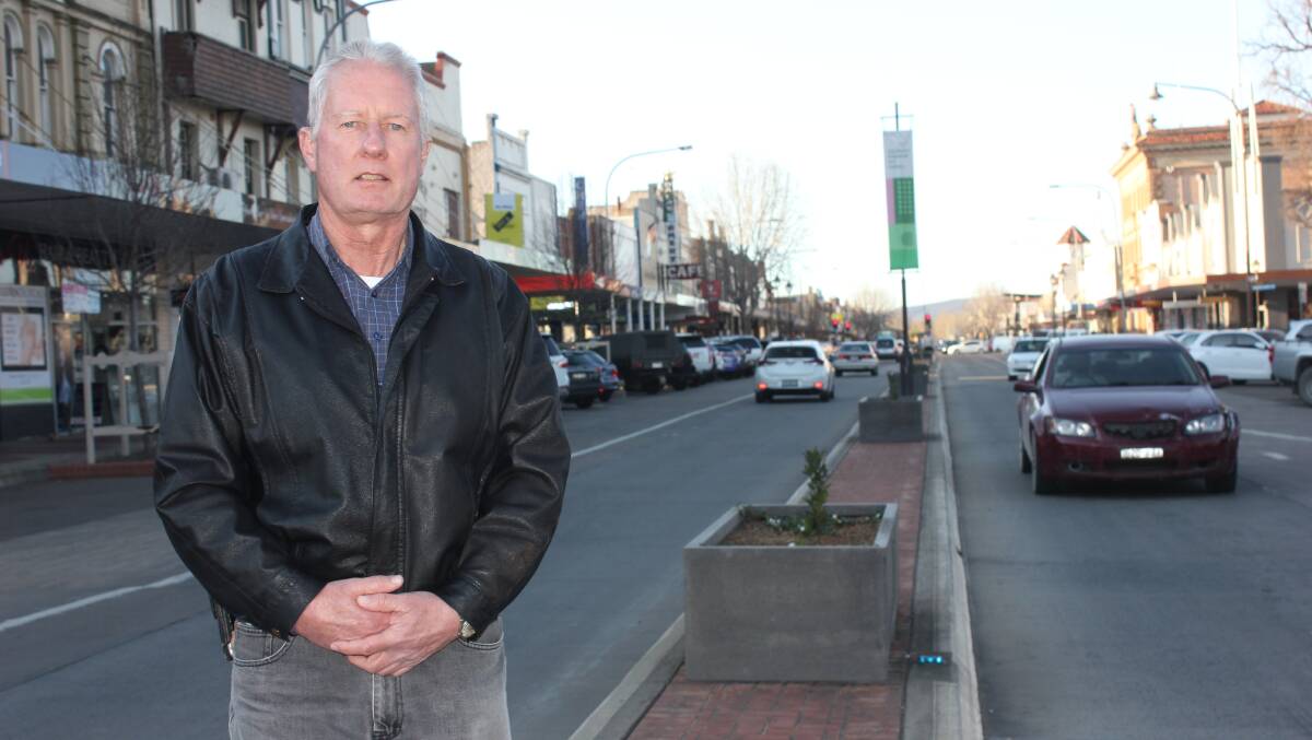 QUESTIONS: Barry McDonald did not expect a $320,000 cost to replace the Auburn Street median strip with trees and drainage. Photo: David Cole.