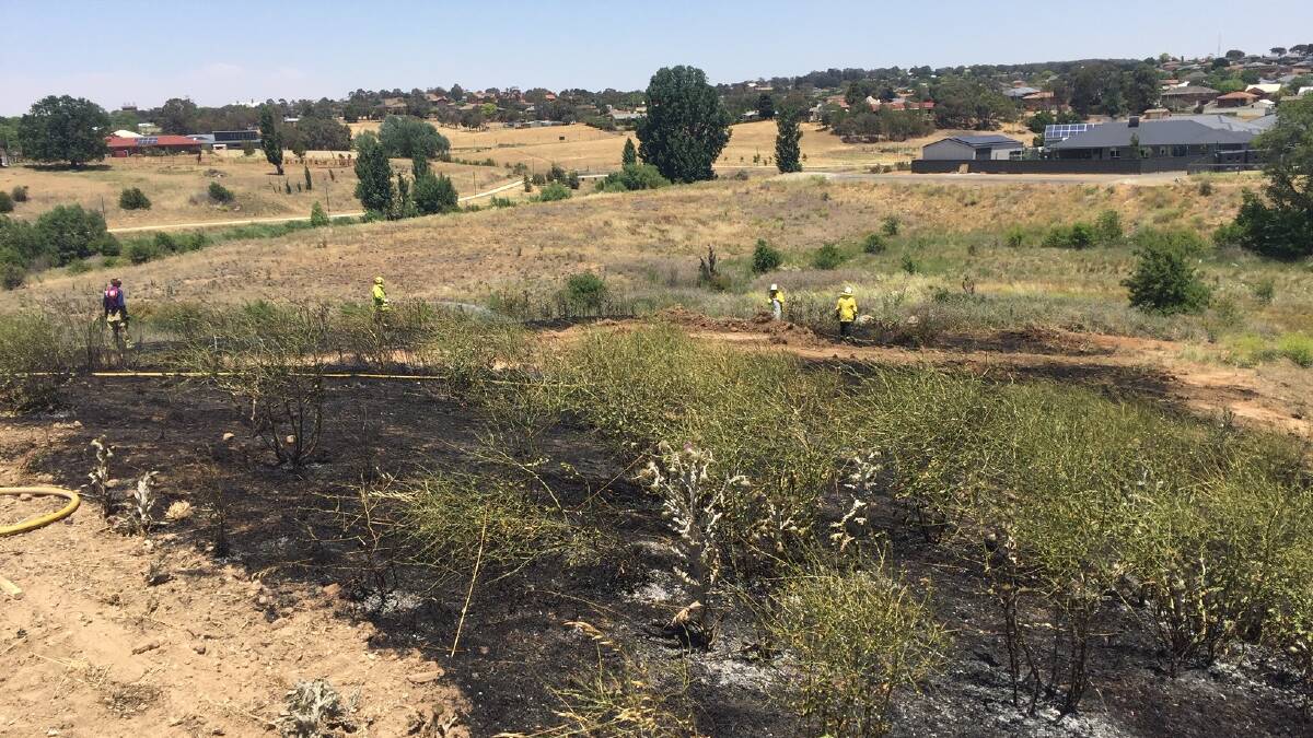 Small grass fire behind Green Valley Rd contained