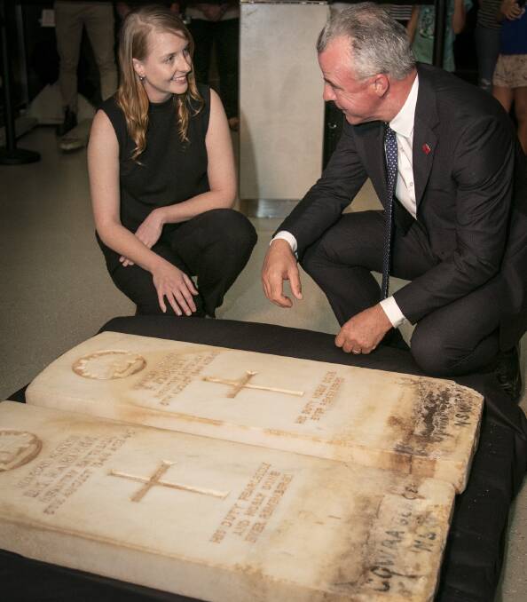 ACQUISTION: Australian War Memorial senior curator Melissa Cadden and director Brendan Nelson with the headstones at the War Memorial in Canberra.